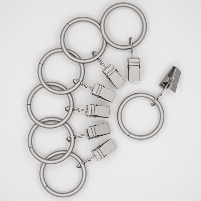 Mainstays 1" Nickel Curtain Clip Rings (7 Pack) with seven metal rings and attached clips in a nickel finish on a white background, designed for secure curtain hanging and easy installation, suitable for window coverings and drapery hardware.
