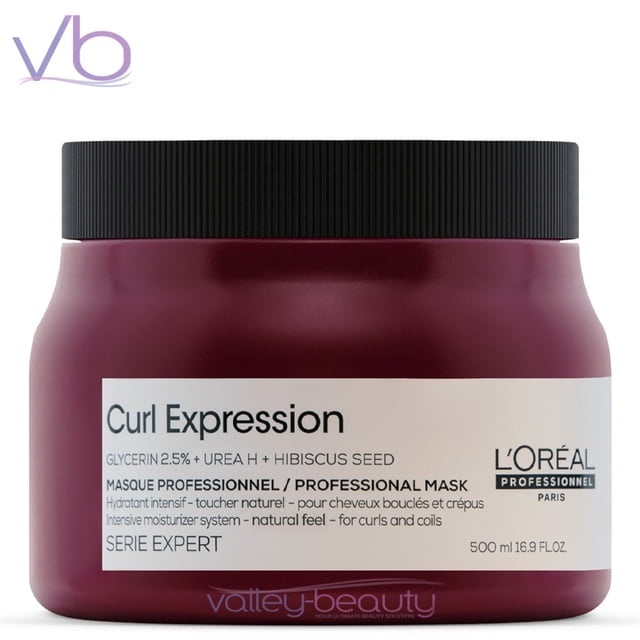 L’Oreal Curl Expression Moisturizing Mask, a 16.9 fl.oz. hair mask designed for deep hydration and frizz control in sensitized curly, coily, and wavy hair. The burgundy jar with a black lid highlights its glycerin, Urea H, and hibiscus seed formula, promoting shine and moisture retention while simplifying detangling.
