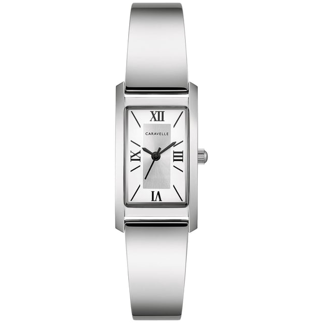Caravelle Ladies Silver-Tone Quartz Watch with an 18mm rectangular stainless steel case, silver white dial with black Roman numerals, three hands including date, and a polished silver-tone stainless steel bracelet tapering from bangle to adjustable link with jeweler's clasp, water resistant to 30m, ideal for everyday and formal wear.