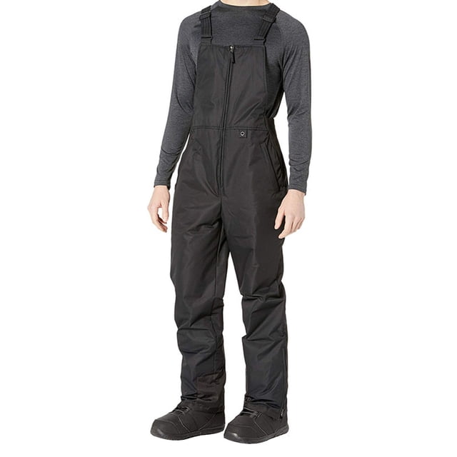 Salopette de Ski Classique pour Hommes, Coupe-Vent, Imperméable, Isolée, en Ripstop, Combinaison une Pièce de Randonnée, Salopette Pantalon en Noir. Conçue pour les Activités Hivernales comme le Ski, la Randonnée et le Cyclisme, avec Bretelles Ajustables, Fermeture Éclair à l'Avant et Matériau en spandex durable. Classée comme Pantalon de Neige pour Hommes, Offerte en Tailles P à 5TG.