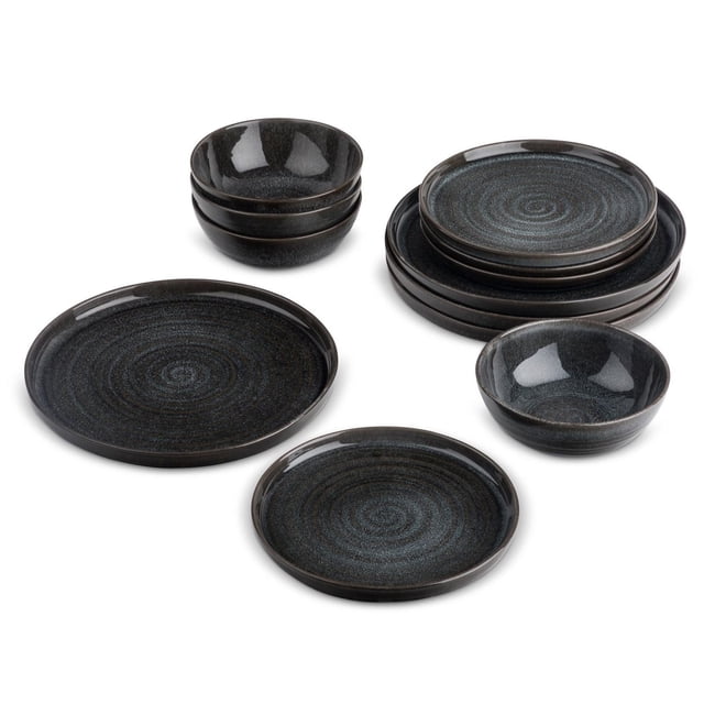 Yellowstone 12-Piece Ceramic Dinnerware Set, Rip Collection includes stoneware dinner plates, salad plates, and bowls with a dark blue and black reactive glaze featuring spiral patterns and ergonomic handles, microwave and dishwasher safe, ideal for everyday use and entertaining.