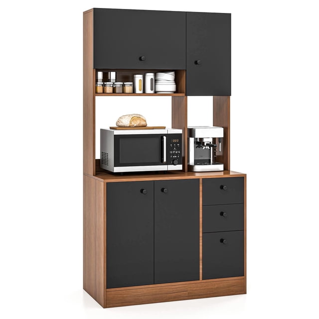 Giantex Microwave Stand Cabinet in black and walnut finish, a freestanding kitchen storage pantry with a spacious countertop, three enclosed cabinets, three drawers, and an open shelf. Shown with a microwave, coffee maker, and kitchen essentials, it offers versatile storage for appliances, tableware, and spices. Suitable as a pantry cabinet or kitchen storage solution.