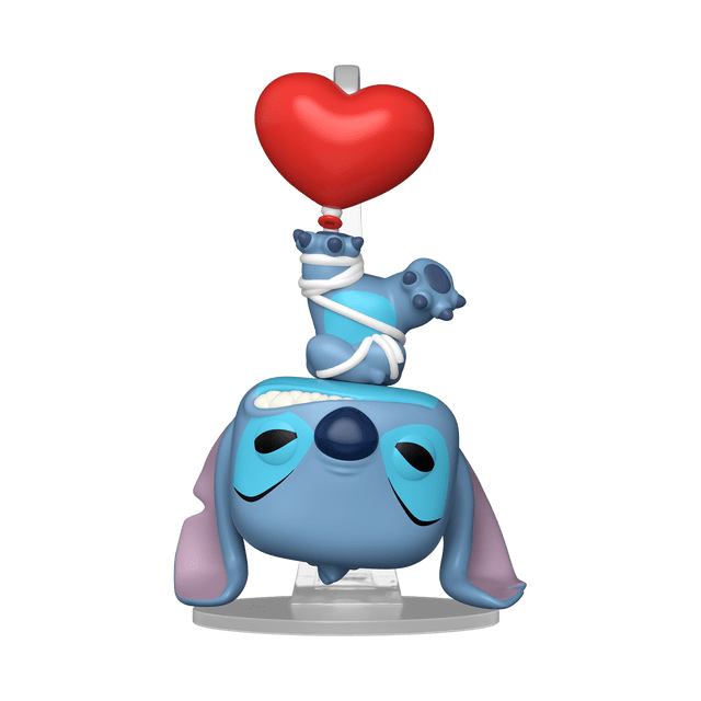 Funko POP Disney: L&S S4- Stitch w/Balloon Collectible Vinyl Figure features a blue vinyl figure of Stitch upside down with closed eyes and a toothy smile, holding a red heart-shaped balloon tied with white string, mounted on a clear display base, suitable for collectors and display.