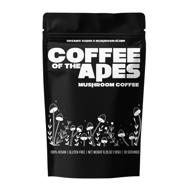 Coffee Of The Apes - Instant Organic Mushroom Coffee centered front view of a 185g branded pouch showing Super 6 mushroom blend with MCT oil and Arabica instant coffee, 30 servings (6g each), crafted in Canada; neutral studio background, often used to make hot or iced mushroom lattes.
