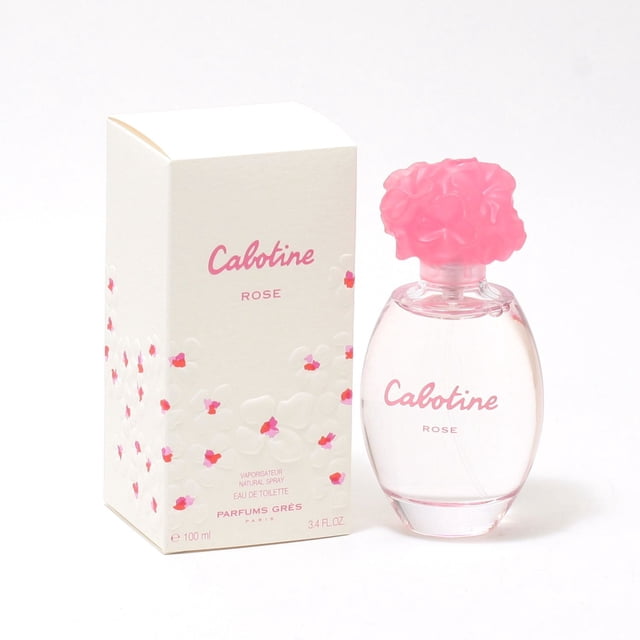 Cabotine Rose Ladies by Parfums Gres - Eau De Toilette Spray 100 ml with a clear oval glass bottle topped by a pink floral cap and pink script, next to its white box embossed with white and pink flowers, designed for a fresh floral scent featuring rose and tuberose notes.