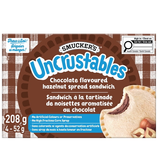 Smucker's Uncrustables Sandwich à la Tartinade aux Noisettes Aromatisé au Chocolat, Surgelé, Lot de 4, 208 g au total, dans une Boîte à Carreaux Brun et Blanc avec Texte Bilingue Anglais et Français, Montrant un Sandwich Rond Sans Croûte avec Garniture au Chocolat et aux Noisettes. Cette Collation de Déjeuner Surgelée Sans Dégât Ne Contient Pas de Colorants Artificiels, d'Agents de Conservation Ni de Sirop de Maïs à Haute Teneur en fructose, Convient pour une Décongélation Rapide et une Utilisation Pratique.