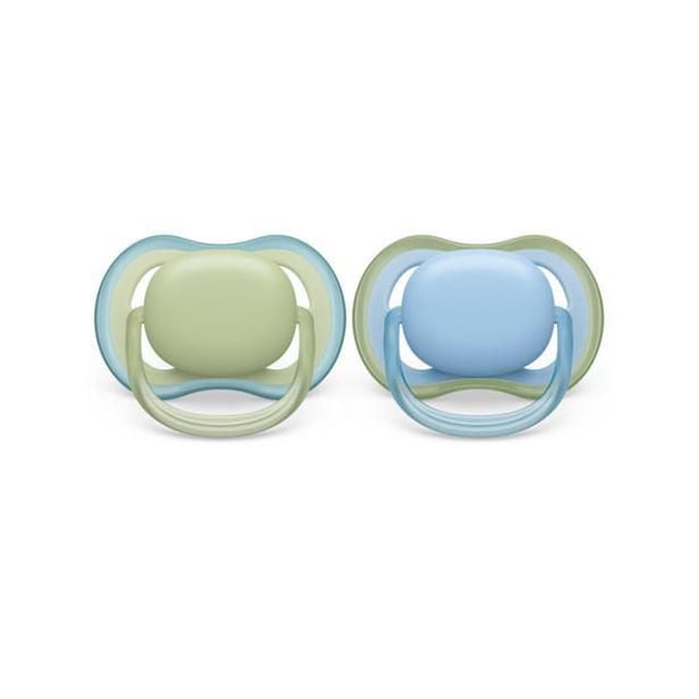 Philips Avent Ultra Air Pacifier 0-6m, 2 pack in pastel green and celestial blue, front-facing pacifiers with lightweight breathable shields featuring four large holes to keep baby's skin dry, soft silicone nipples, BPA-free, and glow-in-the-dark handles.