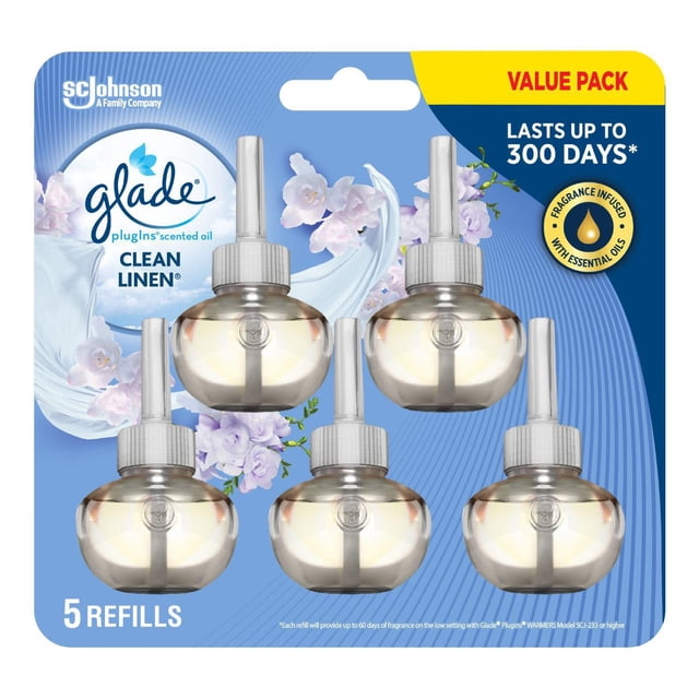 Glade PlugIns® Huile Parfumée Recharge 5 Paquets VP Clean Linen avec Cinq Bouteilles de Recharge d'Huile Rondes Transparentes avec Capuchons Blancs sur Fond floral Bleu, Conçues comme Recharges de Désodorisant Offrant jusqu'à 300 Jours de Parfum Longue Durée Infusé d'Huiles Essentielles.