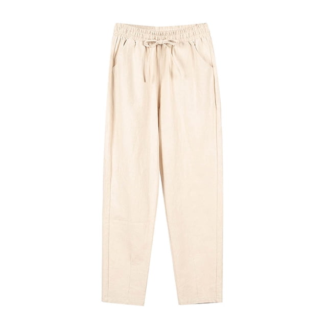 Timegard Pants for Women Elastic Waisted Drawstring Solid Color Crop Pants Casual Comfy Trousers Pockets. These beige cropped pants feature an elastic waistband with a drawstring for adjustable comfort, side pockets, and a relaxed fit. Made from 95% polyester and 5% spandex, they are lightweight, breathable, and ideal for casual outings or lounging. The pants are displayed on a white background, highlighting their simple and versatile design.