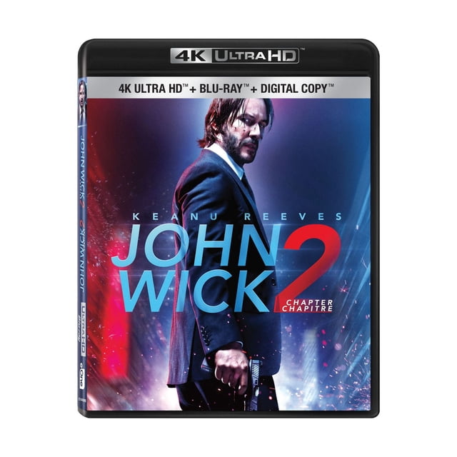 John Wick : Chapitre 2 (4K Ultra HD + Blu-ray + Copie Numérique) Couverture de Film Mettant en Vedette un Homme en Complet Sombre Tenant une Arme de Poing sur un Fond Bleu et Rouge Illuminé avec des Étincelles, Mettant en Valeur le thriller d'Action avec Keanu Reeves.
