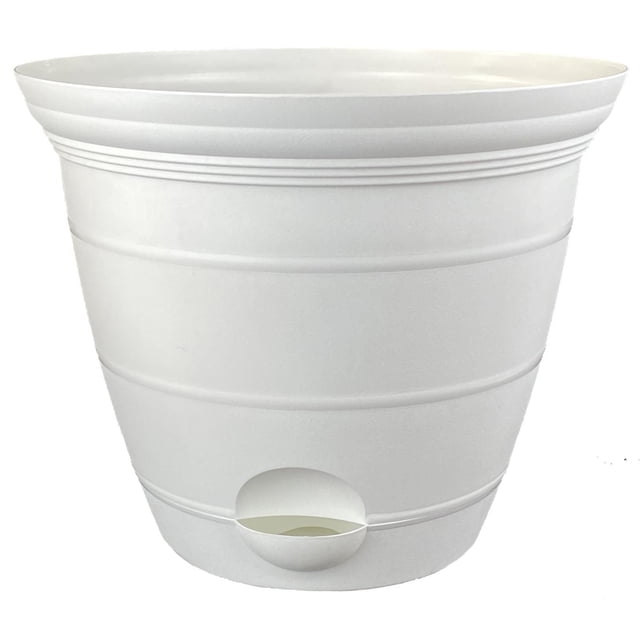 15IN STRIPE SELF WATERING PLANTER in white with a tapered round shape, horizontal stripe texture, and a built-in water reservoir visible through a circular opening near the base, measuring 15 inches wide and 12.8 inches high, ideal for garden planter use and suitable for indoor herb growing.