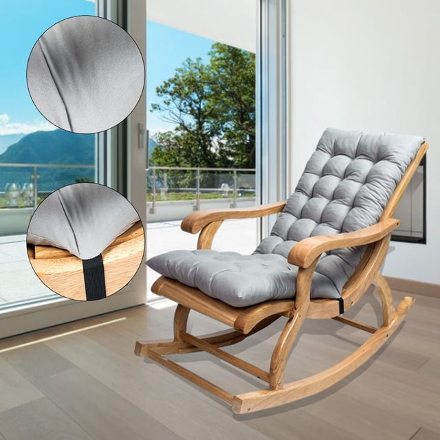 Lounger chair cushion designed for rocking chairs, recliners, and sun loungers. Made of soft suede polyester fiber with thick pearl cotton filling for extra comfort. The cushion measures approximately 120x50x12cm and features a brushed finish with anti-slip backing. Shown in a light grey color on a wooden rocking chair in a bright indoor setting with a view of a patio and mountains.
