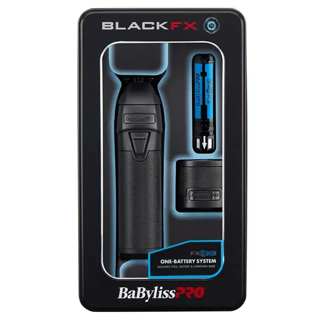 BaBylissPRO FXONE BlackFX Cordless Trimmer Battery System featuring an all-metal interchangeable battery design with a black graphite deep-tooth T-blade. Includes a high-strength lower blade, N1 brushless motor with dual bearings for 7,200 RPM / 14,400 SPM efficiency, and a removable hair pocket door. The ergonomic trimmer has a knurled metal barbell grip, tampered end cap with a hidden hanging hook, and a 4-stage LED ring battery indicator. Comes with a dual voltage charging base, interchangeable lithium battery pack with up to 3 hours of runtime, and a quick-release button. Packaged in a sleek black box with visible components.