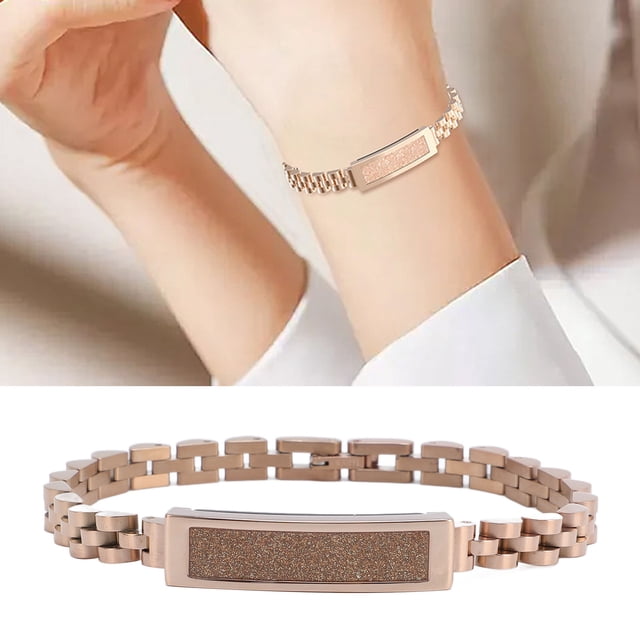Smart Health Wristband, Swimming and Sleep Monitor Wearable Activity Fitness Tracker with a stylish zinc alloy design and adjustable strap length of approximately 8.46 inches. Displayed in a rose gold finish, it is worn on a wrist and shown separately. Features include pedometer, sleep monitoring, remote selfie control, and IP68 rainproof swimming capability. Ideal for fitness tracking and wearable technology enthusiasts. Package includes a charging cable, user manual, and adjusting tool.