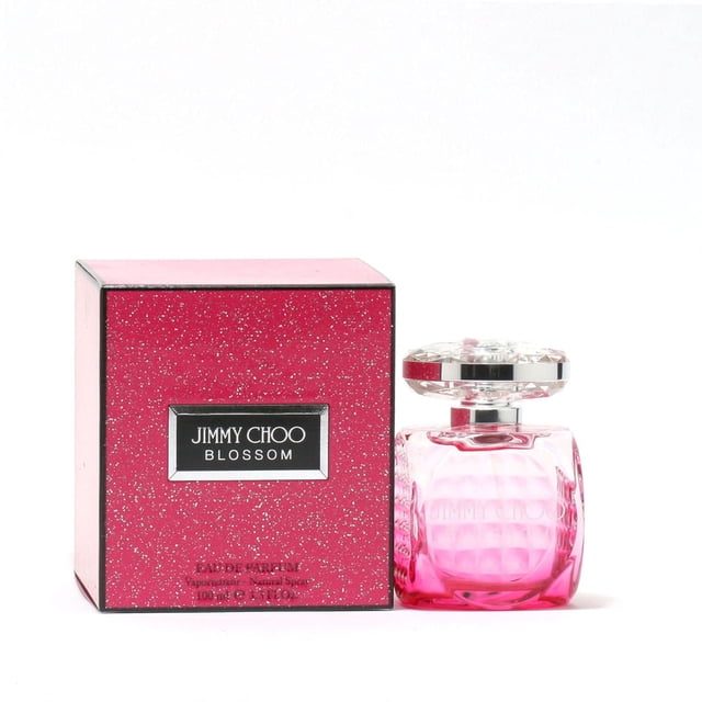 Jimmy Choo Blossom Ladies Eau De Parfum Spray 100mL with a pink glittery box and a transparent pink glass bottle topped by a faceted clear cap, featuring a floral fruity scent with citrus, rose, sweet pea, white musk, and sandalwood notes, often used for daily fragrance.