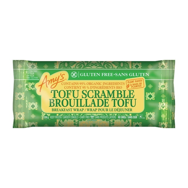 E-AMYS ORGANIC TOFU SCMBL WRAP in green and yellow packaging, a 156g gluten-free, dairy-free, plant-based frozen breakfast wrap filled with organic tofu scramble, hash browns, and veggies, suitable as a vegan breakfast or snack option.