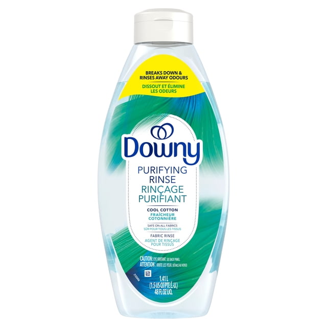Downy Purifying Rinse Laundry Odour Remover in Cool Cotton scent, 1.41 L clear plastic bottle with white flip cap and blue-green feather design, fabric rinse that breaks down and rinses away odours at the source, safe for all washable fabrics including activewear and delicates, often used to refresh musty towels and pet bedding.
