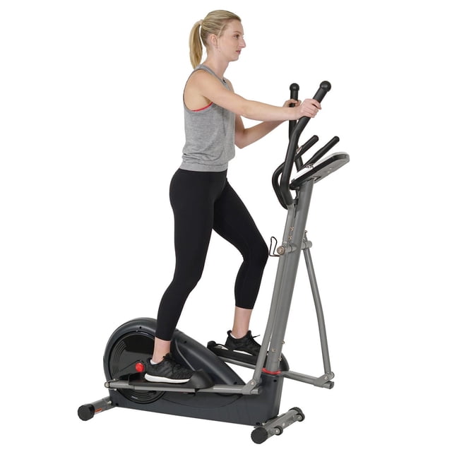 Sunny Health & Fitness Entraîneur Elliptique Préprogrammé SF-E320002 avec une Femme s'Exerçant sur l'Elliptique Gris avec Pédales Texturées Noires, Guidon à Mouvement Complet et Moniteur de performance Avancé Affichant la Vitesse, l'Heure et la Fréquence Cardiaque, Conçu pour des Entraînements Complets Personnalisables avec 16 Niveaux de Résistance.