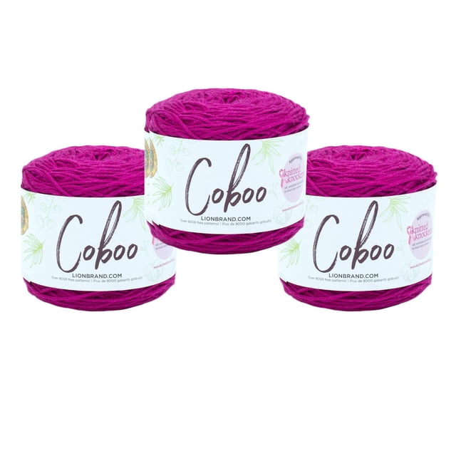 Lion Brand Coboo Yarn, three skeins in vibrant magenta with white labels featuring the Coboo logo and natural fiber illustrations, made of 51% cotton and 49% bamboo, ideal for year-round garments, shawls, and home décor knitting projects.