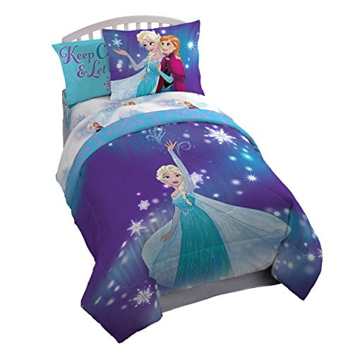 Disney Frozen 'Magical Winter' 7 Piece Full Bed In A Bag featuring a vibrant design with Elsa and Anna from Frozen. Includes a reversible comforter, fitted sheet, flat sheet, and two standard pillowcases. Made of 100% polyester with warm fill, perfect for kids' bedrooms. This kids' bedding set is easy care and machine washable.