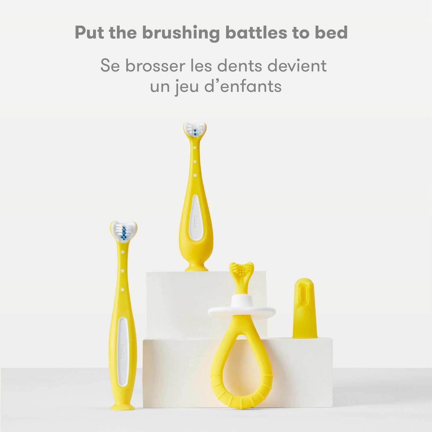 Frida Baby - Brosse à dents d'entraînement SmileFrida pour tout-petits, serre-dents triple angle