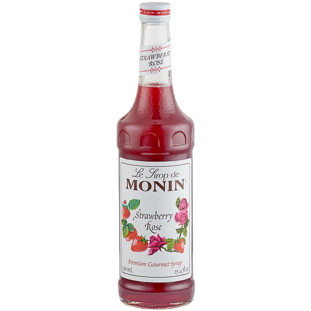 Monin 750 ml Sirop Aromatisant Premium Fraise et Rose dans une Bouteille en Verre Élégante avec Liquide Rouge Vif. l'Étiquette Présente des illustrations de Fraises et de roses, Mettant en Valeur la Combinaison de Saveurs de Fraise et de Rose Confites. Fait avec du Sucre de Canne Pur et Sans Ingrédients Artificiels, Ce Sirop clean label Rehausse les cocktails, Lattés, Thés Glacés et Limonades Sans Être Trop Sucré. Compatible avec une Pompe à Sirop de 0,25 oz pour une Distribution Précise.