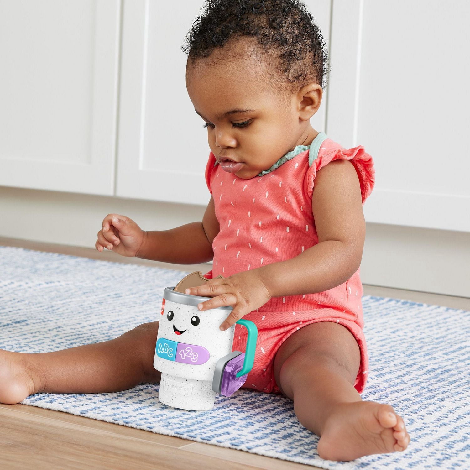 Fisher-Price Rires et Éveil Tasse à café Réveil et apprentissage, multilingue