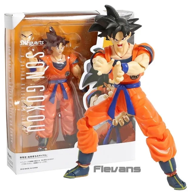 Dragonball Super Son Goku Ultra Instinct SHF Collection Action Figure PVC Model Figurals. A 15-16.5cm PVC action figure of Son Goku in his Ultra Instinct form, wearing an orange and blue outfit, posed dynamically in front of its branded packaging box. Suitable for collectors and fans of Dragonball Super.