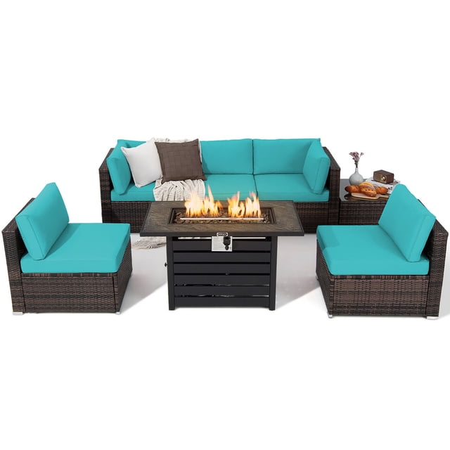 Gymax 7PCS Patio Rattan Furniture Set with a 42-inch fire pit table and turquoise cushions. The set includes a mix brown PE rattan frame, a propane fire pit with 50,000 BTU heat output, and adjustable flame settings. The fire pit table can be converted into a coffee table with a tempered glass top. The set features two corner sofas, three armless sofas, a coffee table, and a fire pit table, all with turquoise cushions. Made with sun-protective, durable materials and a sturdy steel frame for outdoor use. Accessories include lava stones, a waterproof cover, and an instant touch-up pen.