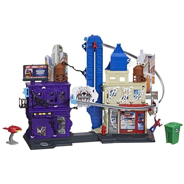 Marvel Spider-Man VenomVersus Web Slinging City Playset featuring an 18-inch tall cityscape with purple Venom and beige-blue buildings connected by a 38-inch repositionable zipline. Includes a 4-inch poseable Spider-Man figure swinging on webs, a flip-down Venom face, projectile launcher, fire hydrant, and recycling bin. Designed for kids 4 and up to enjoy interactive web-slinging and wall-crawling play.