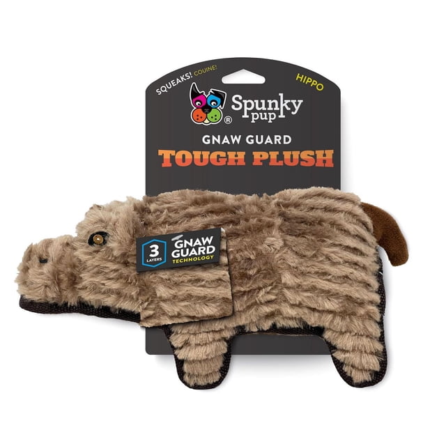Spunky Pup Tough Plush Hippo dog toy in brown textured plush with reinforced black edges and a small brown tail, featuring Gnaw Guard 3-layer technology label, attached to black packaging with Spunky Pup branding and product name.