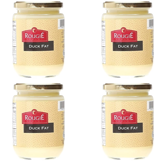 Rougié Rendered Duck Fat 320g, Pack of 4. Four jars of rendered duck fat, each weighing 320 grams (11.28 oz), made from free-range Moulard ducks raised in Quebec, Canada. The jars display a beige label with the Rougié logo and 'Duck Fat' text. Gluten-free and suitable for Keto and Paleo diets, this product enhances roasted potatoes, seared meats, and sautéed vegetables.