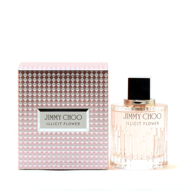 Jimmy Choo Illicit Flower perfume for women with a clear faceted glass bottle featuring vertical ridges and a black square cap, displayed next to its pink and silver geometric patterned box with the brand and fragrance name on the front.