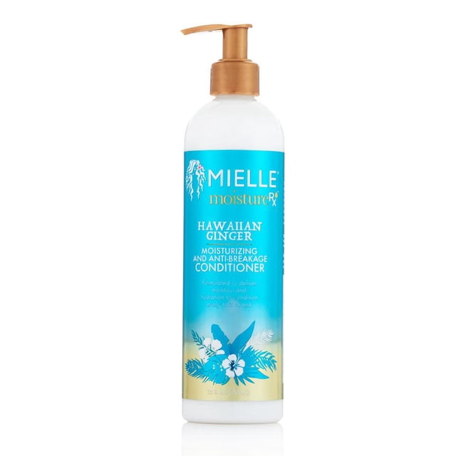 Mielle Organics Revitalisant Hydratant et Anti-Casse au Gingembre Hawaïen en Bouteille de 12 Oz avec Distributeur à Pompe. la Bouteille Présente un design Bleu et Blanc vibrant avec des accents Floraux Tropicaux et des Détails Dorés. Convient pour Hydrater et Revitaliser les Cheveux, Elle Est Formulée avec des Ingrédients Naturels comme l'Huile de Racine de Gingembre, l'Huile d'Argan et l'Aloès pour Réduire la Casse et Améliorer l'Hydratation. Idéal pour une Utilisation après un Shampoing.