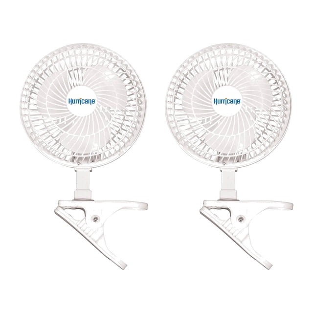 Hurricane Classic 6" Mini Clip On Fan for Desks & Night Stands, White (2 Pack). This set includes two compact white fans with a 6-inch diameter, featuring a sturdy clip base for secure attachment to desks, tables, or shelves. Each fan has a metal grill, adjustable tilt mechanism, and two-speed settings for customizable airflow. Ideal for small spaces like offices, dorms, or grow tents, these fans provide a quiet yet powerful cooling breeze with an airflow capacity of 306 CFM. The 5-foot power cord offers flexibility in placement.