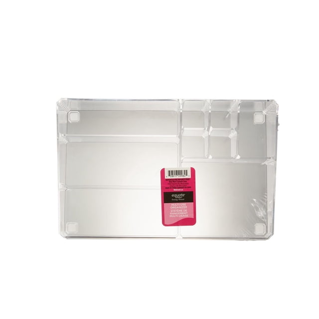 EQUATE BEAUTY MULTI-USE ORGANIZER clear plastic makeup storage organizer with multiple compartments including three large sections and six smaller square sections, rectangular shape with a pink label in the center, measuring 12.8 inches long and 3.54 inches high, ideal for organizing brushes, tools, and cosmetics, also suitable for storing small craft supplies or office items.