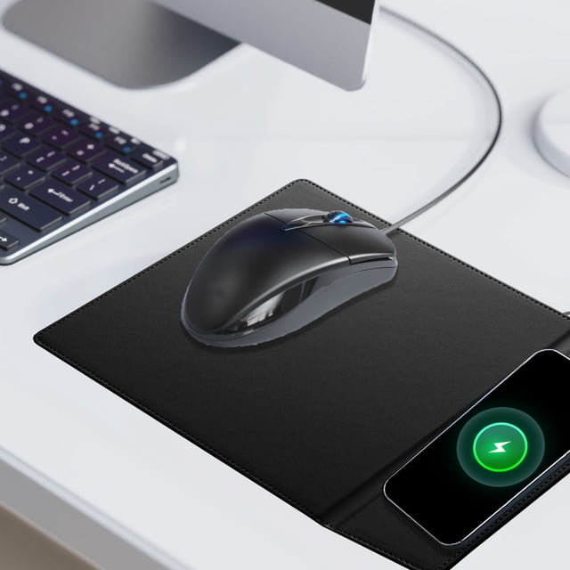 15W fast charging office small computer folding mouse pad multifunction wireless charging stand mouse pad made of black artificial leather. Designed for desks and workstations, it features a wireless charging phone stand and ample space for a wired computer mouse. A smartphone is shown charging on the pad.