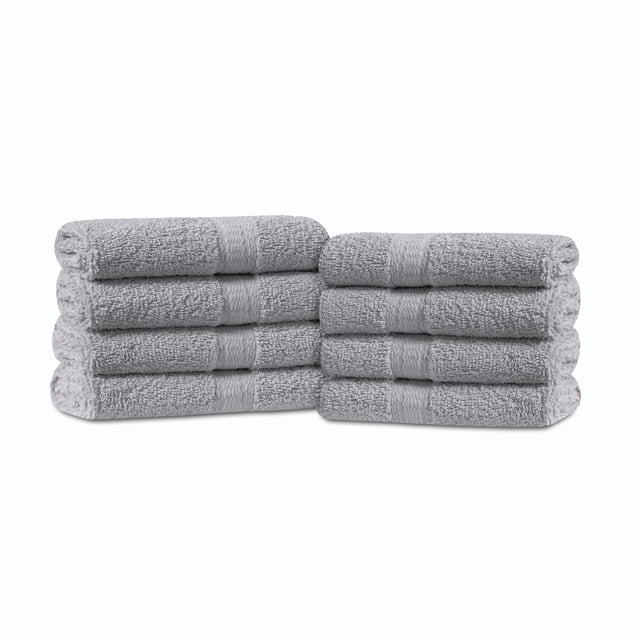 Mainstays 8pk Washcloth Set with eight grey 12x12 inch 100% cotton washcloths stacked in two piles, lightweight, quick-drying, and machine washable, ideal for dorms, shared bathrooms, and suitable for gym or travel use.