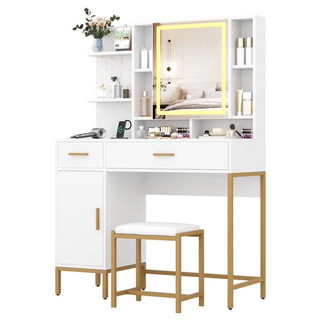 Bureau-coiffeuse Moderne à DEL avec Lumières, Miroir à 3 modes et Station de Recharge pour Chambre. Ce Bureau-Coiffeuse Blanc Présente un Grand Miroir à DEL avec Trois modes d'Éclairage Réglables, une Station de Recharge Intégrée avec ports USB et Prises CA, et un Grand Rangement Incluant Deux Tiroirs à Dessus Transparent, une Armoire et des Étagères Ouvertes. le Bureau Est Fabriqué avec un Cadre en Métal Robuste et du Bois d'Ingénierie, et Comprend un Tabouret Rembourré pour le Confort. les Dimensions Sont de 16 Pouces de Profondeur, 42 Pouces de Largeur et 54 Pouces de Hauteur. Assemblage Requis.