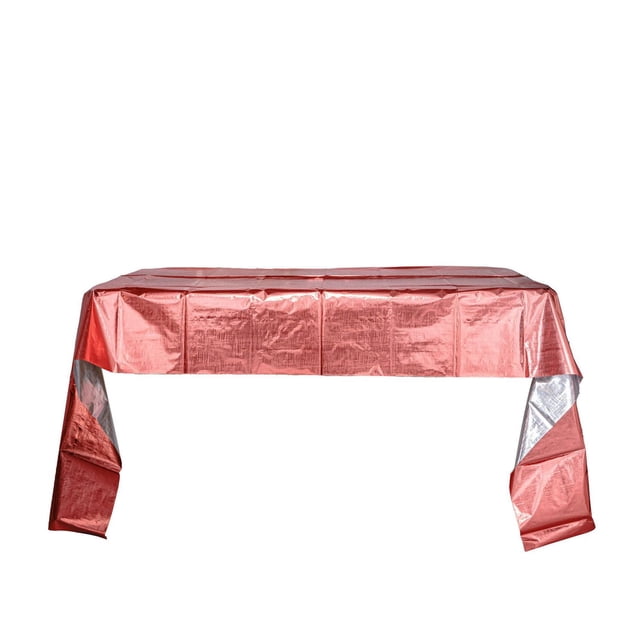 Metallic disposable table cover in vibrant rose gold, sized 96 by 52 inches, draped over a rectangular table with a reflective, shimmering surface that enhances party décor and protects the table from spills.