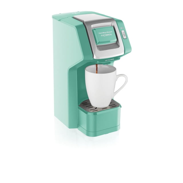 Hamilton Beach Flexbrew Single Serve Coffee Maker in teal green brewing coffee into a white ceramic mug, featuring a compact single-serve brewer design with removable drip tray, easy-fill water reservoir, and compatibility with ground coffee and single-serve packs, suitable for brewing up to 14 oz.