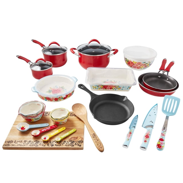 The Pioneer Woman Sweet Romance Aluminum 30-Piece Cookware Set in red with floral accents, including saucepans with lids, a Dutch oven, frying pans, a cast iron skillet, ceramic mixing and baking dishes, a wooden spoon, a floral-engraved cutting board, measuring spoons and bowls, a pie dish with lid, a blue floral slotted turner, and floral-handled knives, suitable for diverse kitchen cooking and prep tasks.