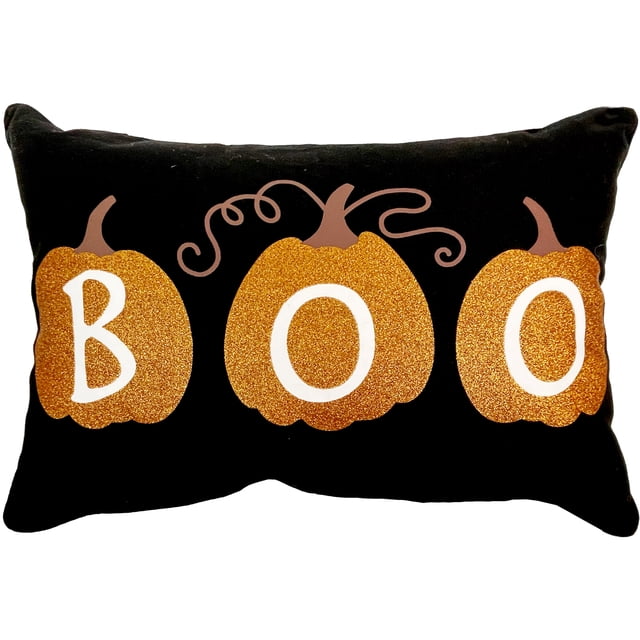 Way to Celebrate! Halloween Boo Pumpkins Decorative Pillow is a 13x20 inch rectangular black polyester cushion featuring three glittery orange pumpkins with white letters spelling 'BOO', perfect for indoor Halloween décor and adding festive texture to sofas, beds, or reading chairs.