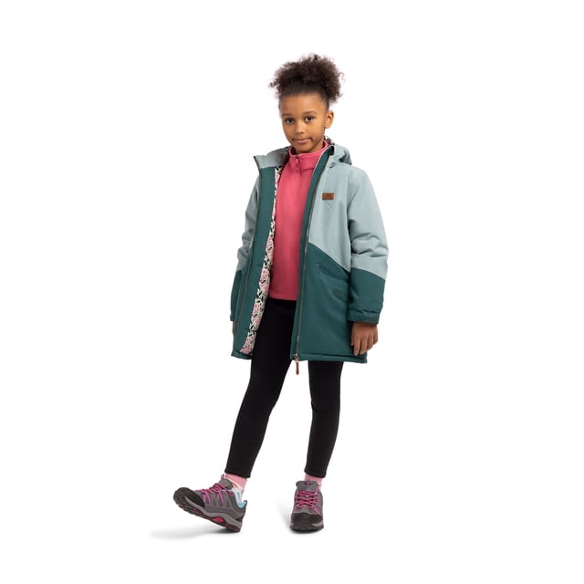 Trespass Kids Waterproof Jacket Oleta, a two-tone raincoat for girls with a padded design and detachable hood. The jacket features adjustable cuffs, two spacious pockets, and a printed lining. Designed with taped seams and windproof material, it provides excellent protection against rain and cold weather. Shown in a green and light grey color combination, styled with a pink inner layer and black leggings.