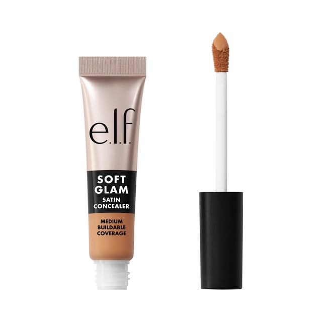 e.l.f. Cosmetics Soft Glam Satin Concealer, 34 Medium Cool, 6.3 mL, shown as a squeezable beige tube with black label and a separate black-capped applicator wand with a doe-foot tip coated in creamy concealer, providing medium buildable coverage and a satin finish for face makeup concealment.