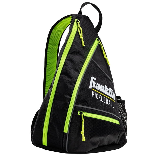 Franklin Sports Pickleball Sling Bag in black with neon green zipper accents and interior lining, featuring hexagonal patterned fabric, multiple zippered compartments including a mesh side pocket, and an adjustable shoulder strap, suitable for carrying and organizing pickleball paddles and accessories.