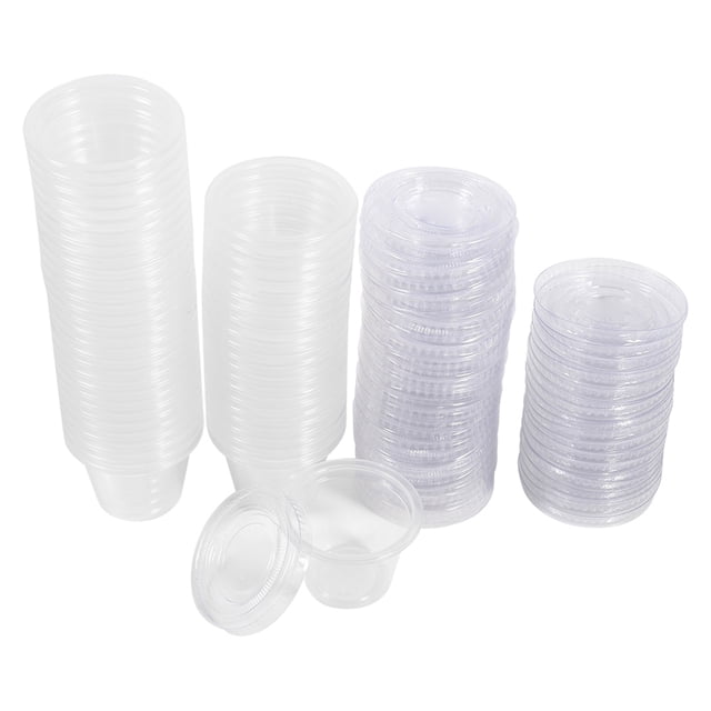 1-4oz portion cups with lids, small plastic containers made of food-grade polypropylene. These clear, airtight, and stackable souffle cups are shown in multiple stacks with matching lids. Ideal for condiments, sauces, dips, jello shots, and small food portions, they are suitable for parties, lunches, and events. The pack includes 50 cups in four sizes ranging from 1oz to 4oz.