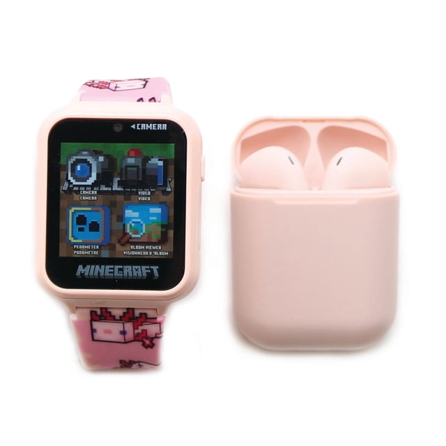 Minecraft Touch Screen Interactive Watch with Bonus Earbuds in pink, a children's smartwatch featuring a square digital touchscreen displaying camera, video, pedometer, and album viewer apps, paired with matching pink wireless earbuds in a charging case, suitable as an introductory wearable technology device.
