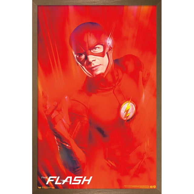 DC Comics TV - The Flash - Key Art Wall Poster, 22.375" x 34" depicting The Flash in his red suit with the yellow lightning bolt emblem on his chest, shown in a centered, front-facing pose with motion blur effects on a vibrant red background, printed on glossy poster paper and framed in wood, ideal for home or office wall décor.