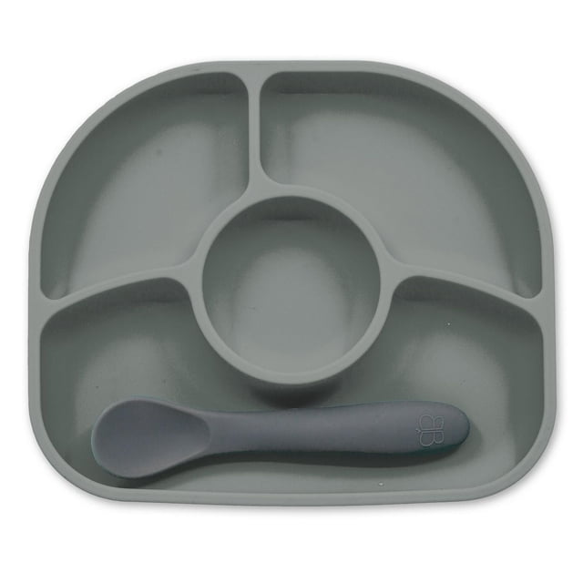 Yumi : Ensemble Assiette et Cuillère en Silicone Gris Comprenant une Assiette en Silicone avec Quatre Compartiments Divisés Incluant une section Ronde Centrale et une Cuillère Grise Assortie, Conçu avec une base à Succion pour Aider les Bébés à Manger de Façon Autonome et à Gérer la Taille des Portions.